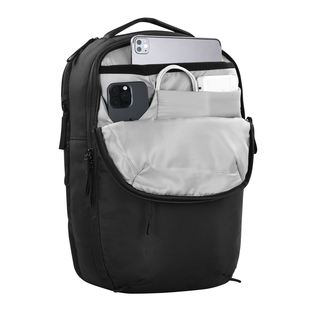 Black backpack with open front compartment showing electronic devices on a white background
