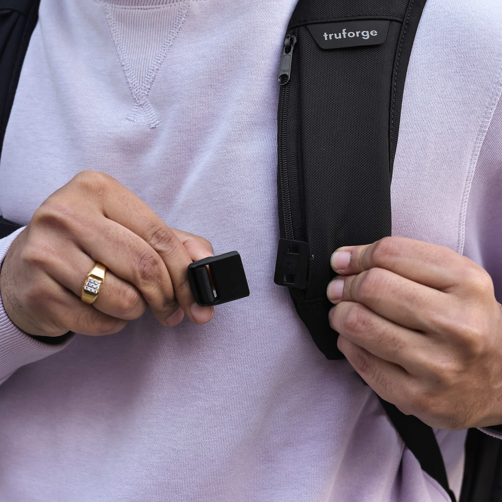Person attaching sternum strap 